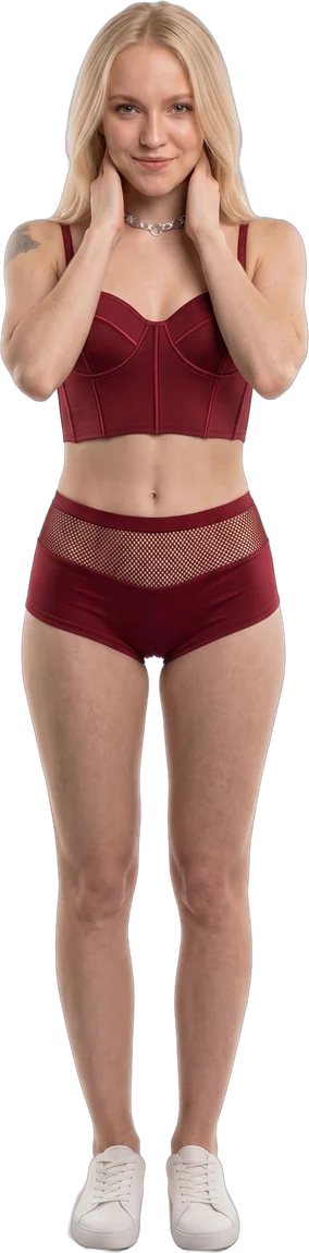 Clarissa posing in a burgundy outfit